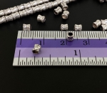 KK-014 Thai karen hill tribe silver 40 fancy print mini hourglass bead