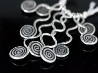 2KH-024 thai karen hill tribe silver 9 swirl wire charm